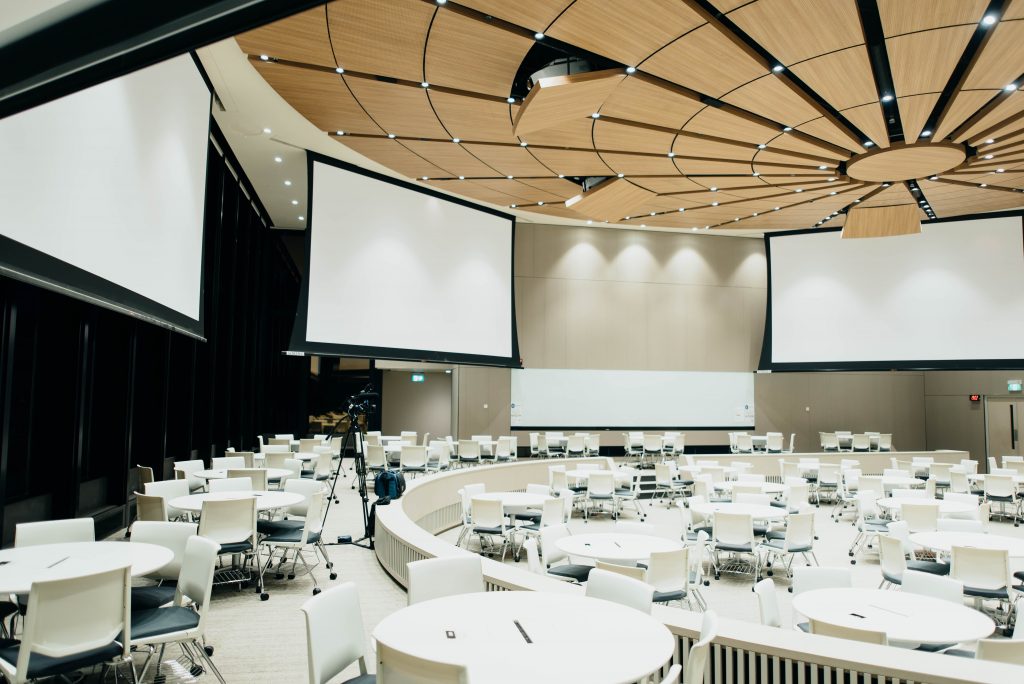 banquet area with multiple installed projector screens
